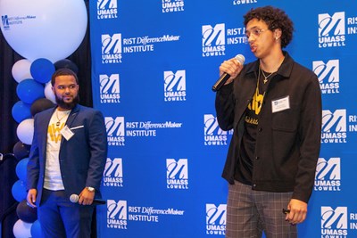 Minds with Purpose team members Jeurys Santiago, left, and Sammy Santana won the Significant Social Impact award.