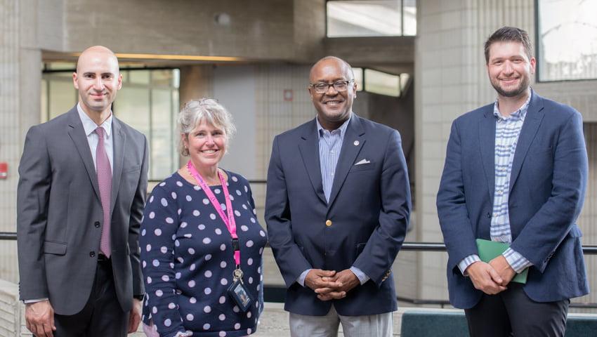 Pictured (l to r): Ryan Mudawar (VP of Education and Workforce Programs), Dr. Tracie Ferreira (chair and associate professor of Bioengineering), Ken Turner (president and CEO), & Joseph Sullivan (VP of Marketing, Communications and Community Relations)