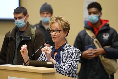 Chancellor Jacquie Moloney speaks with students about the importance of ethics and social responsibility in their future careers.