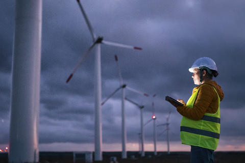 Electricity Maintenance Engineer working in the field. Credit: Daniel Balakov/Getty Images