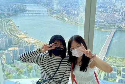 Chemistry major Trang Vy Bui, right, poses for a photo from the observation deck of Lotte Tower in Seoul with a friend she met while studying abroad in South Korea this spring.