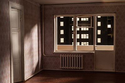 In Romaniko's photographs, windows in the walls look onto other walls, as in "Untitled (Empty Room III)."