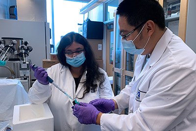 Biomedical engineering and biotechnology Ph.D. candidates Sanika Suvarnapathaki, left, and Xinchen Wu