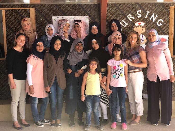 Karr, seen with participants in the PhotoVoice project in Lebanon. Photo Courtesy of Valerie Karr. 