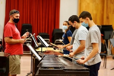 Band campers play xylophones in a percussion breakout session.