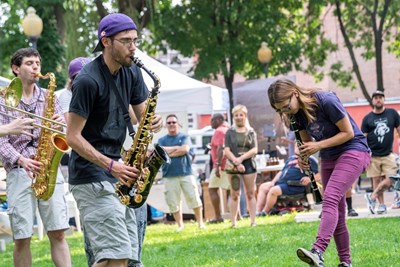 The Party Band rocks a crowd at Keroauc Park in Lowell during a Fresh Beets summer show.