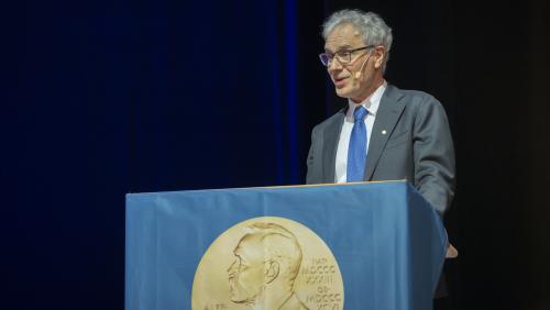 Dr. Victor Ambros at the 2024 Nobel Prize Winner Ceremony presenting to a crown.