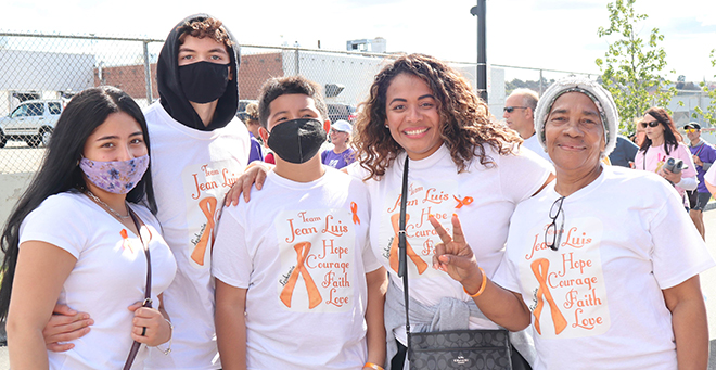 Team Jean Luis smile at the camera while attending the 2021 UMass Cancer Walk and Run